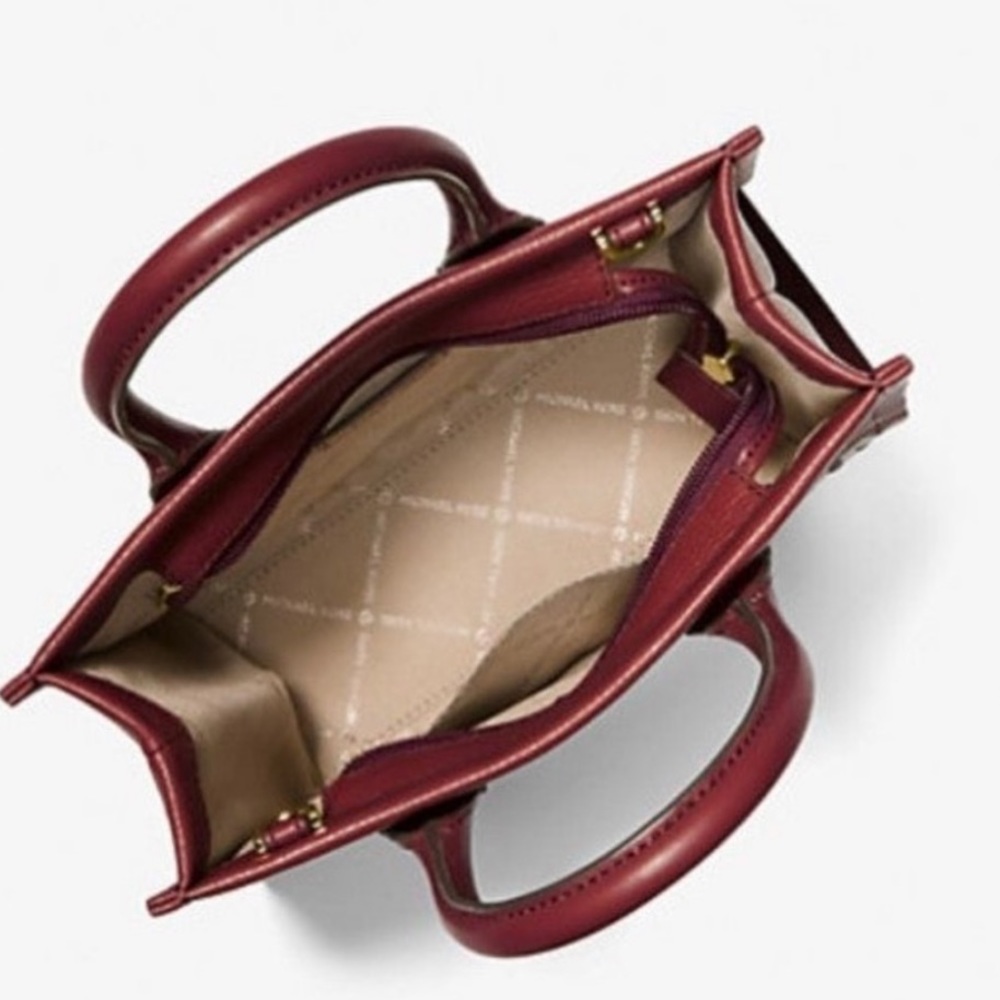 MICHAEL KORS
Mirella Small Logo Embossed Pebbled Leath
Crossbody Bag
DARK CHERRY - Picture 7 of 16